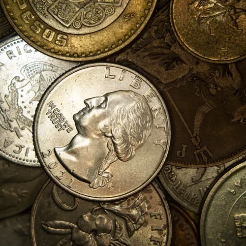 a-heap-of-world-coins-closeup-grunge-financial-ba-2025-02-10-07-54-27-utc-rgxmi1akx553wxz5tf32k7377cnu4t3ckkomukbnns